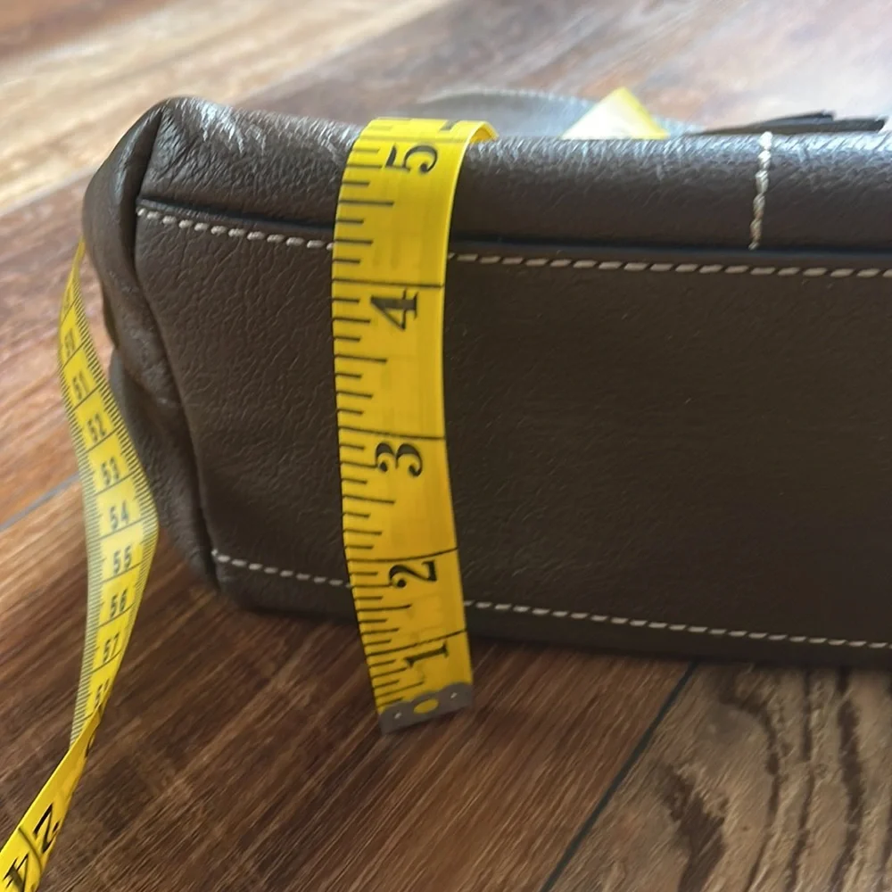 Dooney and Bourke. Brown leather shoulder bag. Has interior stains. - Picture 14 of 14